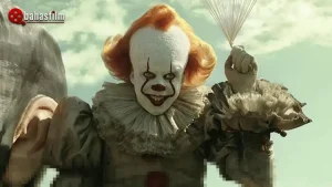 Ilustrasi konsep supercut film IT karya Andy Muschietsi, menggambarkan penggabungan adegan masa kecil dan dewasa Losers' Club dengan visual Pennywise.