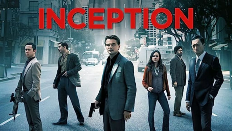 Poster film Inception menampilkan Leonardo DiCaprio berdiri di tengah jalan kota yang dikelilingi gedung-gedung tinggi, bersama jajaran pemeran utama lainnya seperti Joseph Gordon-Levitt dan Elliot Page, dengan teks merah besar bertuliskan "INCEPTION" di bagian atas.